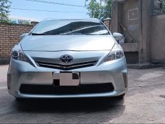 Фото авто Toyota Prius v (+)