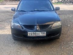 Фото авто Mitsubishi Lancer