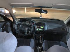 Фото авто Mazda 323