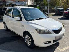 Фото авто Mazda Demio