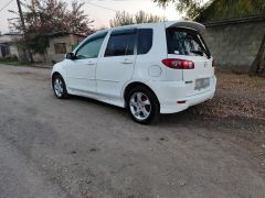 Photo of the vehicle Mazda Demio