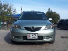 Фото авто Mazda Demio