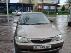 Фото авто Mazda 323