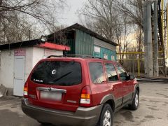 Photo of the vehicle Mazda Tribute