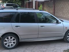 Photo of the vehicle Nissan Primera