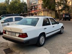 Сүрөт унаа Mercedes-Benz W124