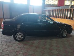 Сүрөт унаа Mazda 323