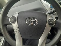 Photo of the vehicle Toyota Prius v (+)