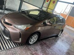 Photo of the vehicle Toyota Prius v (+)