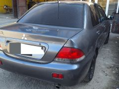 Photo of the vehicle Mitsubishi Lancer