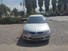 Photo of the vehicle Mitsubishi Lancer