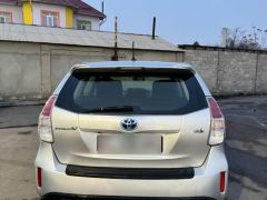 Фото авто Toyota Prius v (+)