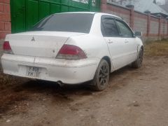 Фото авто Mitsubishi Lancer