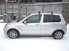 Photo of the vehicle Mazda Demio