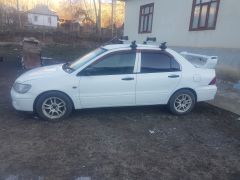 Фото авто Mitsubishi Lancer