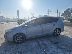 Photo of the vehicle Toyota Prius v (+)