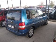 Photo of the vehicle Mazda Demio