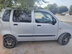 Photo of the vehicle Suzuki Wagon R+