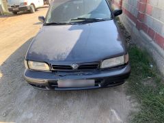 Photo of the vehicle Nissan Primera