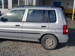 Photo of the vehicle Mazda Demio