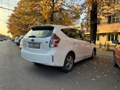 Photo of the vehicle Toyota Prius v (+)