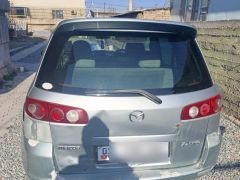 Сүрөт унаа Mazda Demio