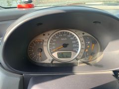 Фото авто Nissan Almera Tino