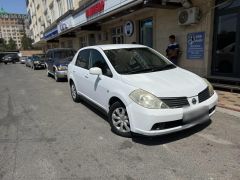 Фото авто Nissan Tiida