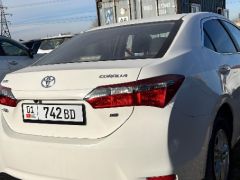 Photo of the vehicle Toyota Corolla