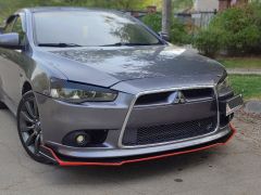 Фото авто Mitsubishi Lancer