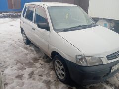 Photo of the vehicle Mazda Demio