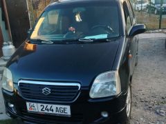 Photo of the vehicle Suzuki Wagon R+