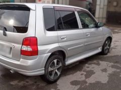 Сүрөт унаа Mazda Demio