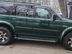 Сүрөт унаа Mitsubishi Montero Sport