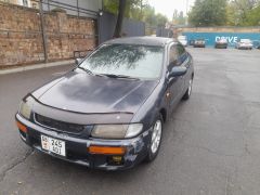 Сүрөт унаа Mazda 323