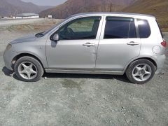 Photo of the vehicle Mazda Demio