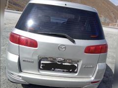 Photo of the vehicle Mazda Demio