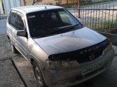 Сүрөт унаа Mazda Demio