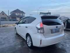 Фото авто Toyota Prius v (+)