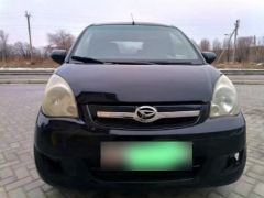 Photo of the vehicle Daihatsu Cuore