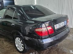 Photo of the vehicle Nissan Almera