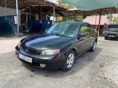 Фото авто Mazda Protege