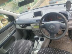 Photo of the vehicle Mazda Demio