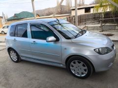 Photo of the vehicle Mazda Demio