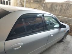 Photo of the vehicle Mazda Familia