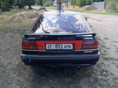 Фото авто Mazda 626