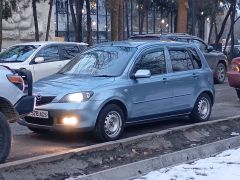 Фото авто Mazda Demio