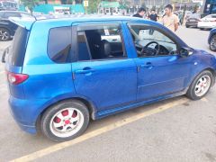 Photo of the vehicle Mazda Demio