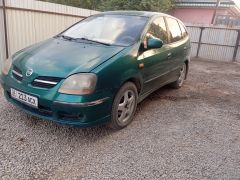 Фото авто Nissan Almera Tino