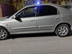 Фото авто Kia Shuma